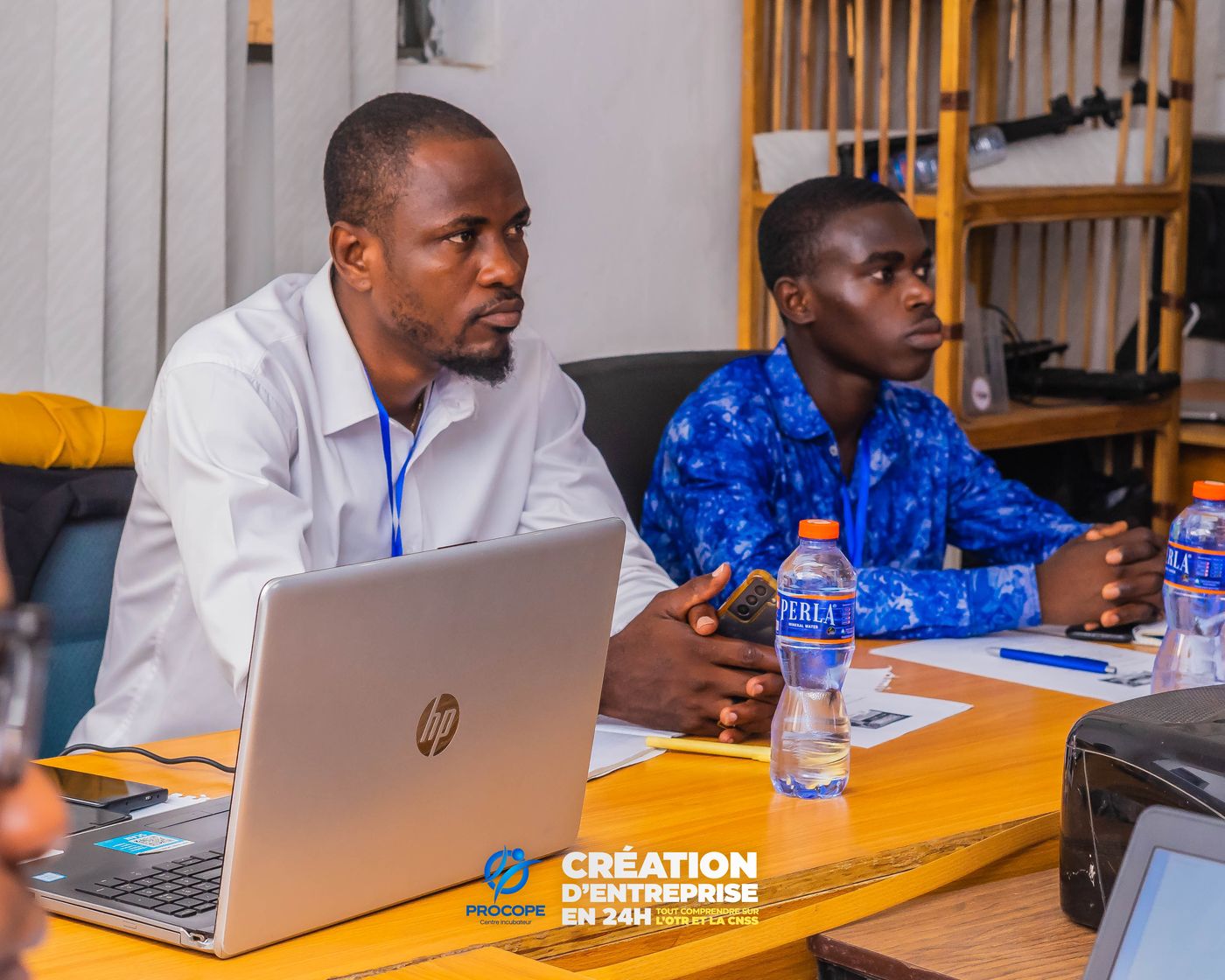 Deux participants concentrés lors d'une formation PROCOPE